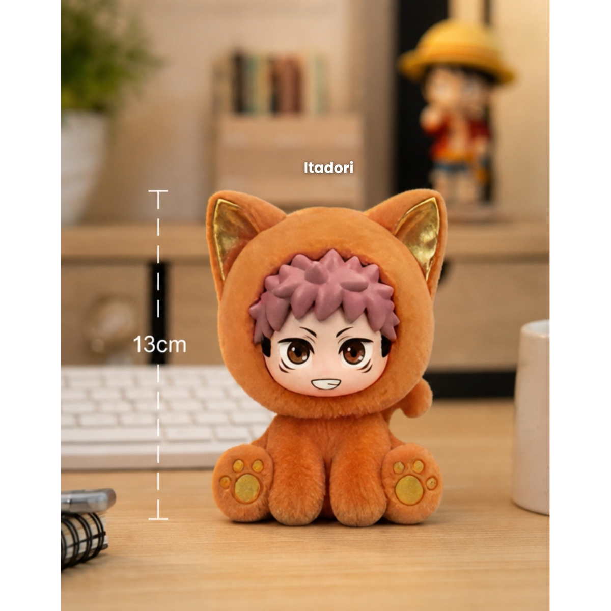 
Yuji Itadori Sitting Cat Party plush pendant in a styled desktop scene