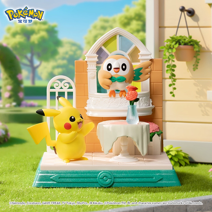 
Pikachu and Rowlet collectible beside a sunny window