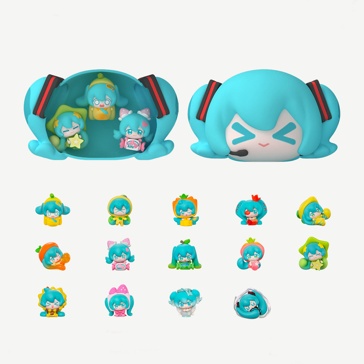 
Miku-head capsule opened beside the full Dopamine Qface miniature lineup