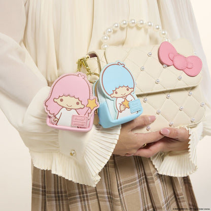 
Kiki and Lala mystery charm examples attached to a larger backpack – backpack not included